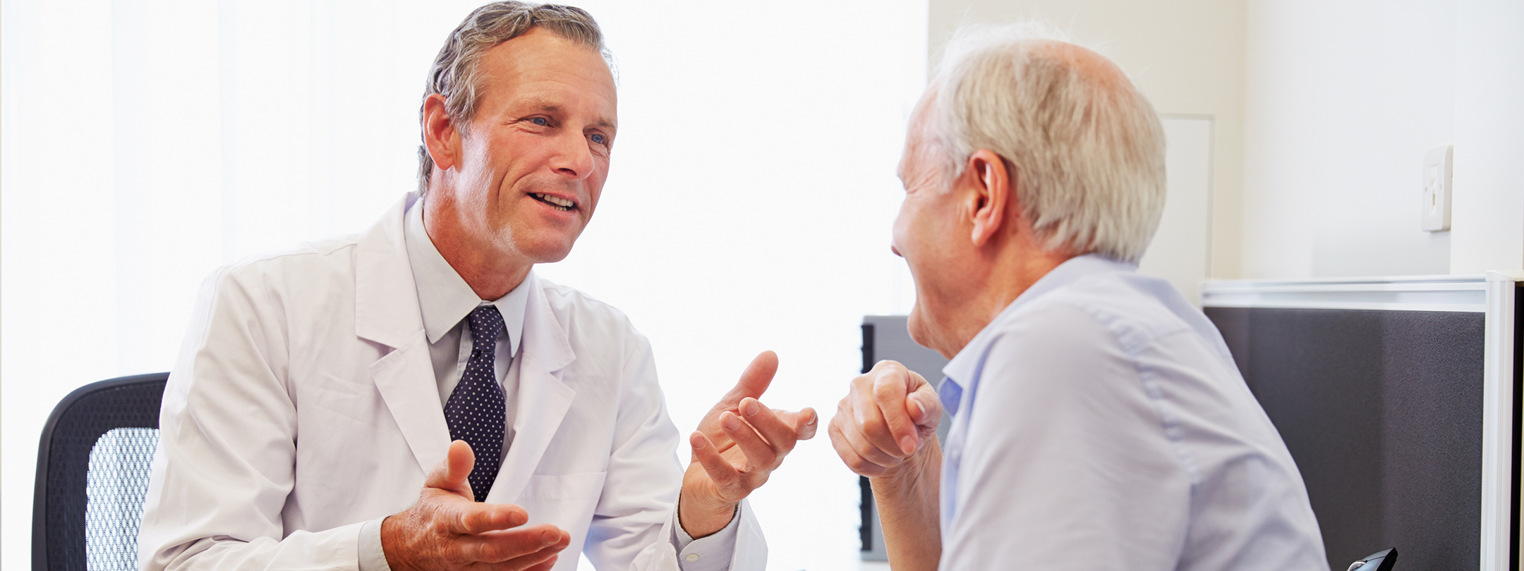 Doctor consulting with his patient