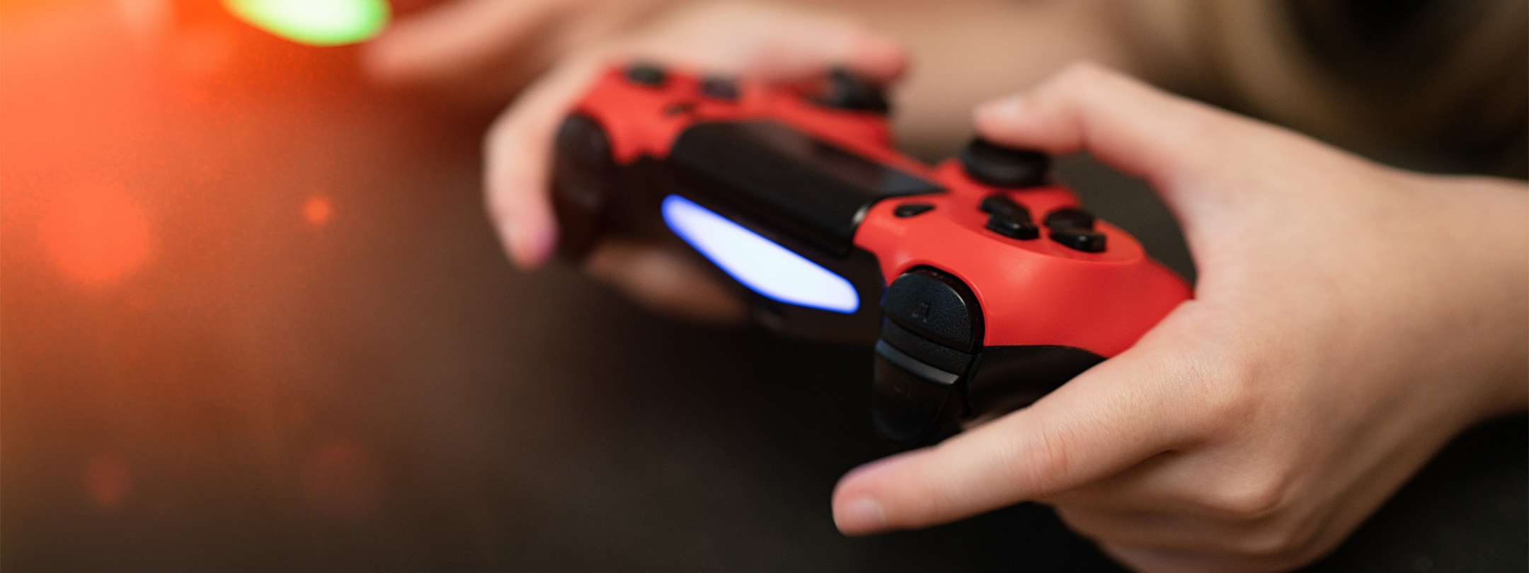 child holding video game controller