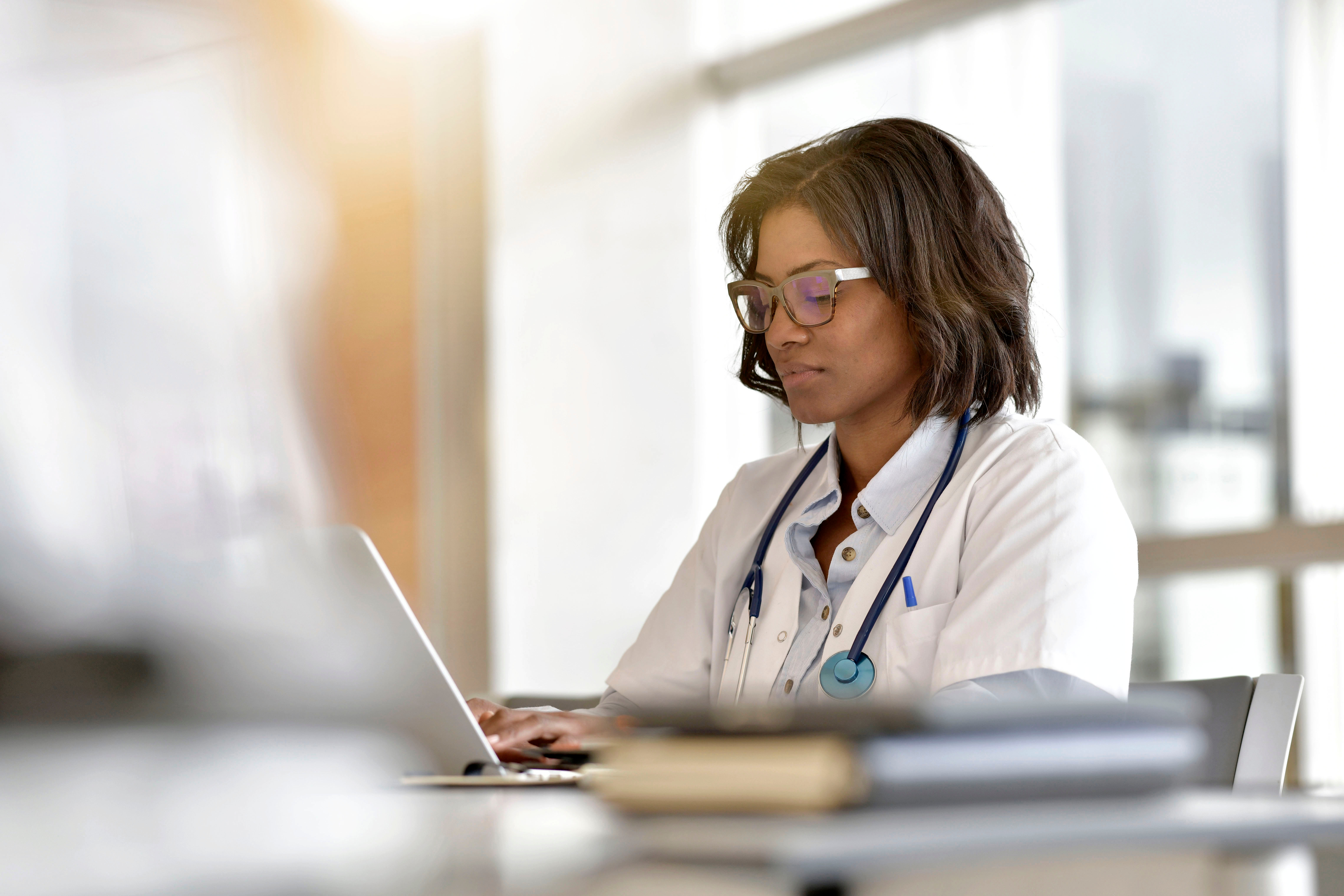 Female doctor on laptop